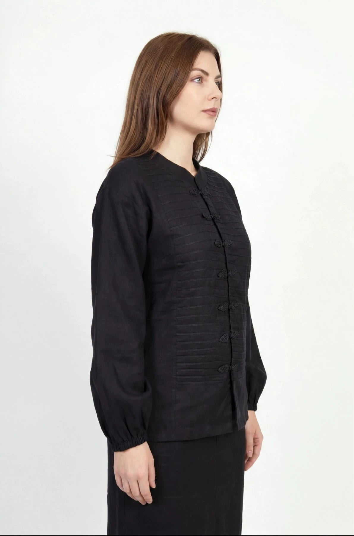 Inori Black Linen Top, black 100% linen mandarin collar blouse with frog-button knots, bell sleeves and adjustable corset-style lace-up back – front view