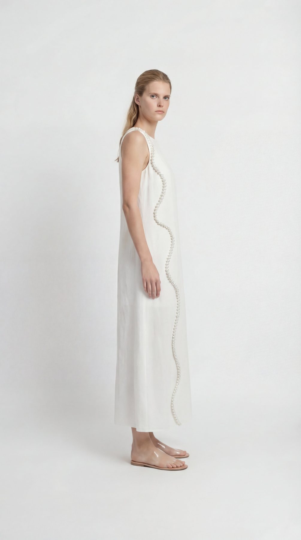 Pearl White Maxi Dress With Kimono Set, pearl white 100% pure linen maxi dress with handcrafted pearl embellishment, sleeveless neckline and back-button closure – side view