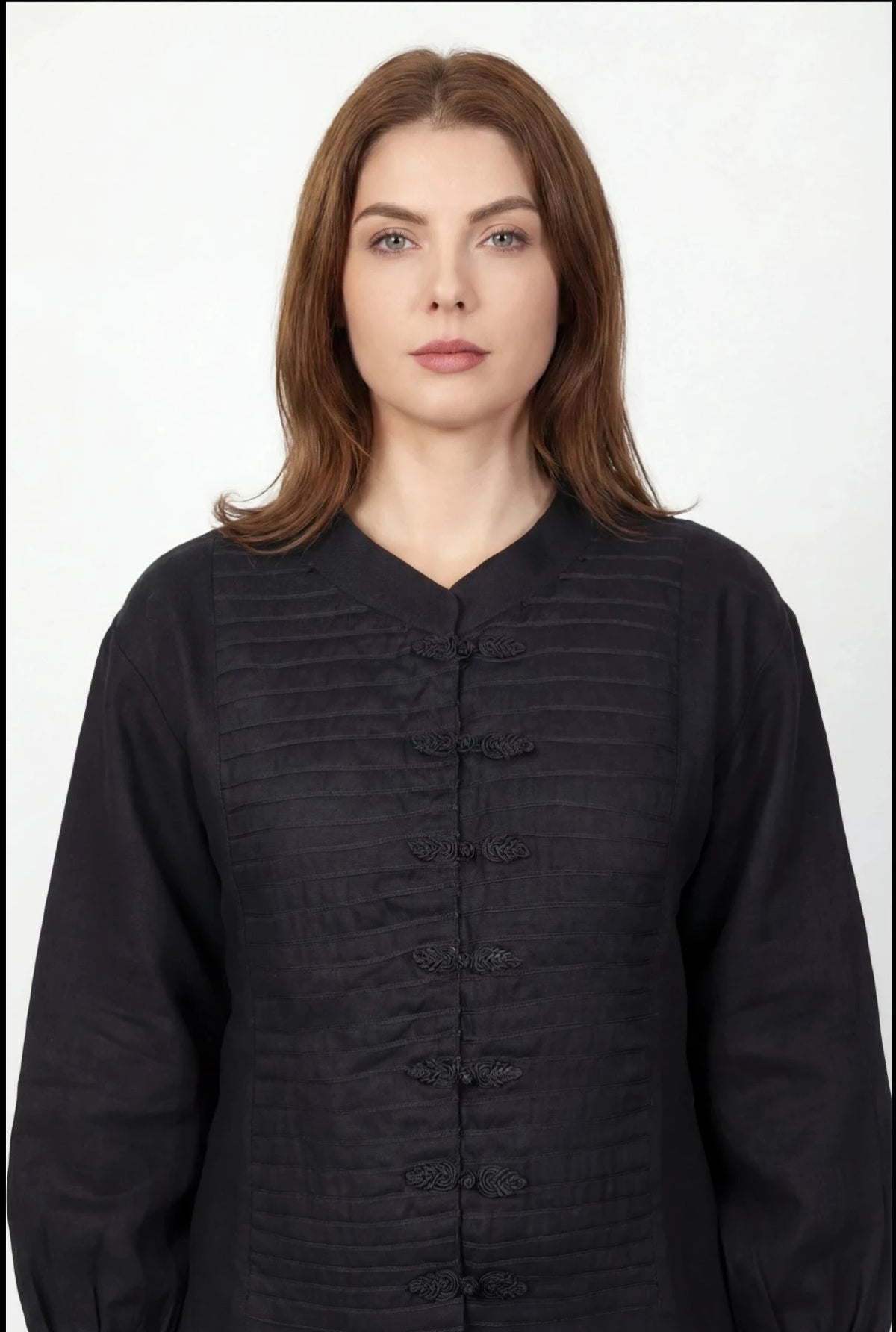 Inori Black Linen Top, black 100% linen mandarin collar blouse with frog-button knots, bell sleeves and adjustable corset-style lace-up back – back view
