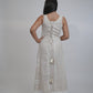 Ibiza Beige Dress, beige sleeveless 100% pure linen maxi dress with sweetheart neckline, fitted bodice and embroidered lace panel work – side view