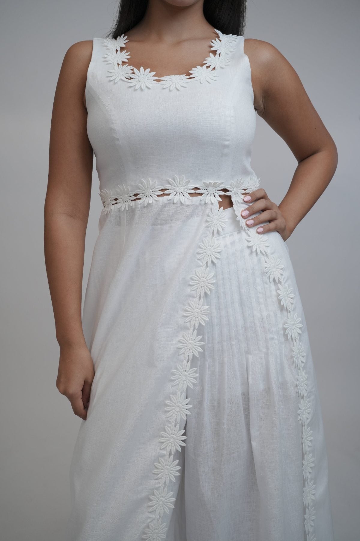 Margot White Linen Co-ord Set, white pure linen co-ord set with sleeveless elongated tunic top, floral embroidery and wide-leg trousers – flat lay detail