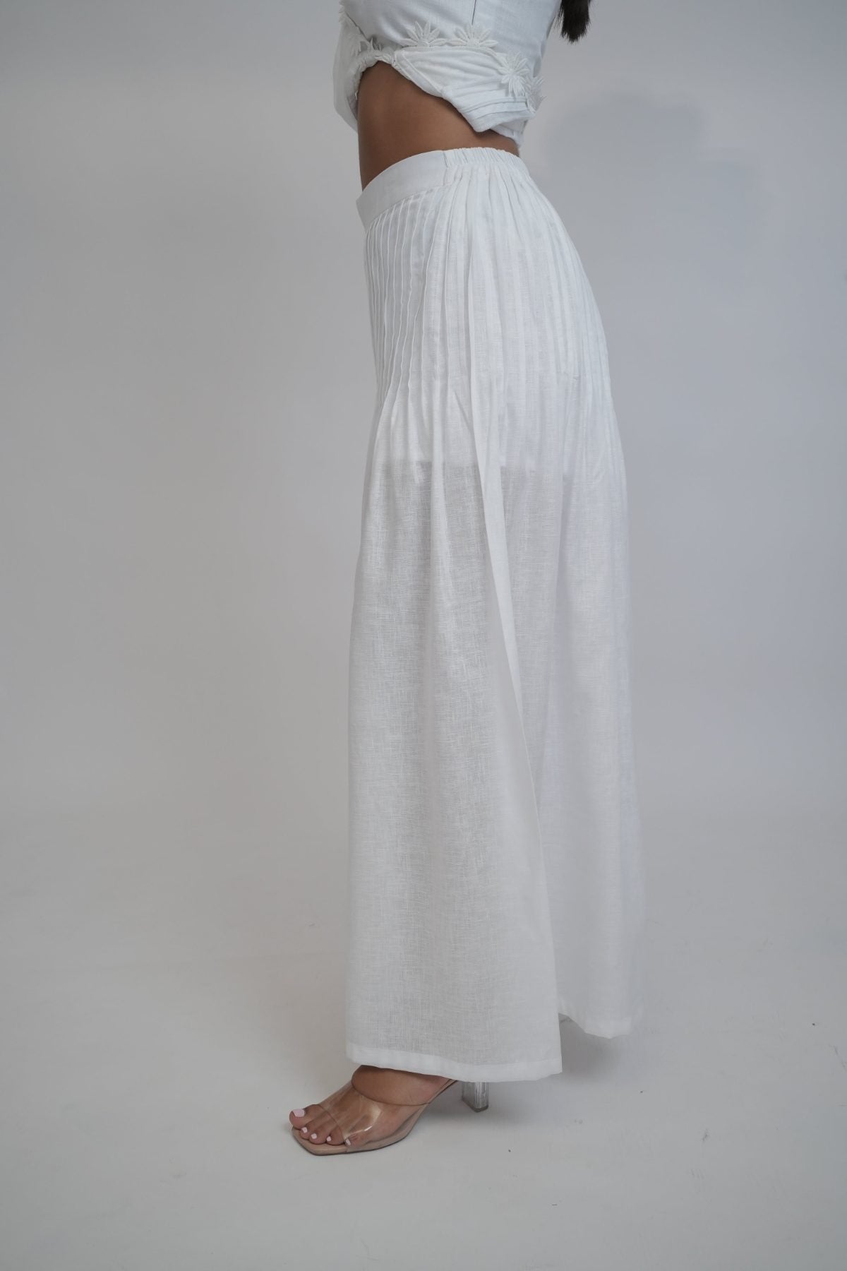 Margot White Linen Co-ord Set, white pure linen co-ord set with sleeveless elongated tunic top, floral embroidery and wide-leg trousers – back view
