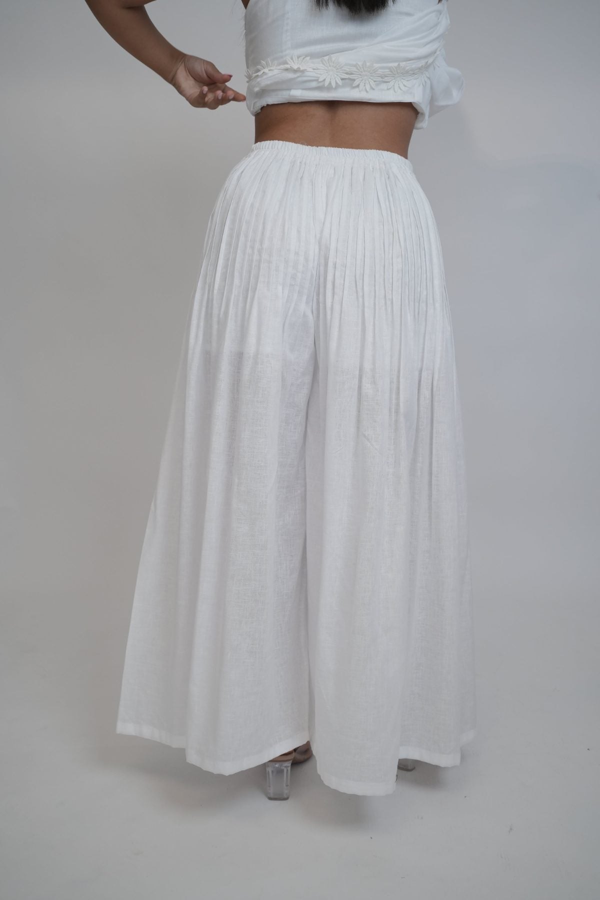 Margot White Linen Trouser, white high-waisted wide-leg pure linen trouser with pintex pleated drape, lined – styled on model