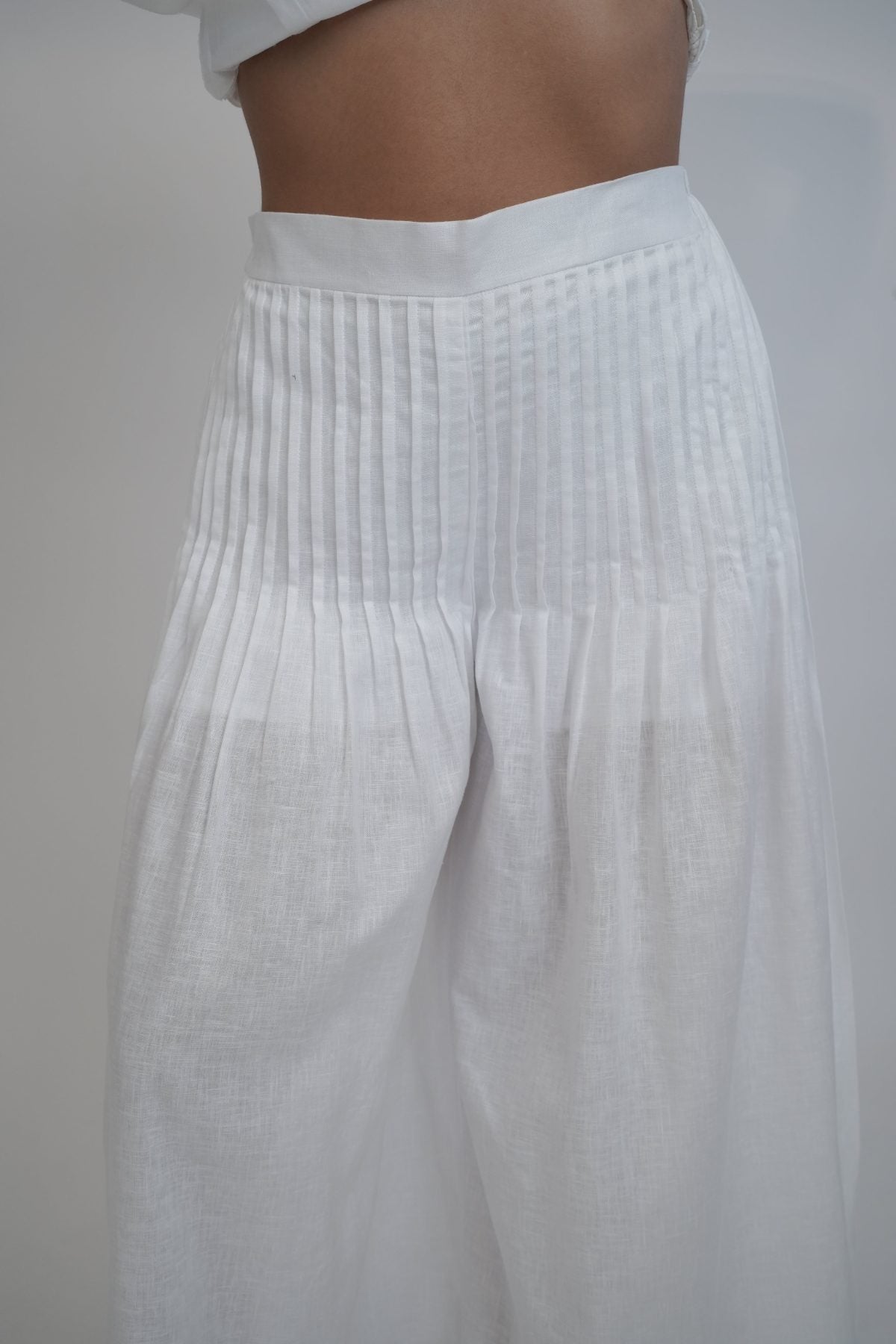 Margot White Linen Trouser, white high-waisted wide-leg pure linen trouser with pintex pleated drape, lined – side view
