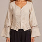 Rumi Top, handcrafted pure linen corset top with hand-braided sleeves, pleated ruffle hem and recycled floral appliques – back view