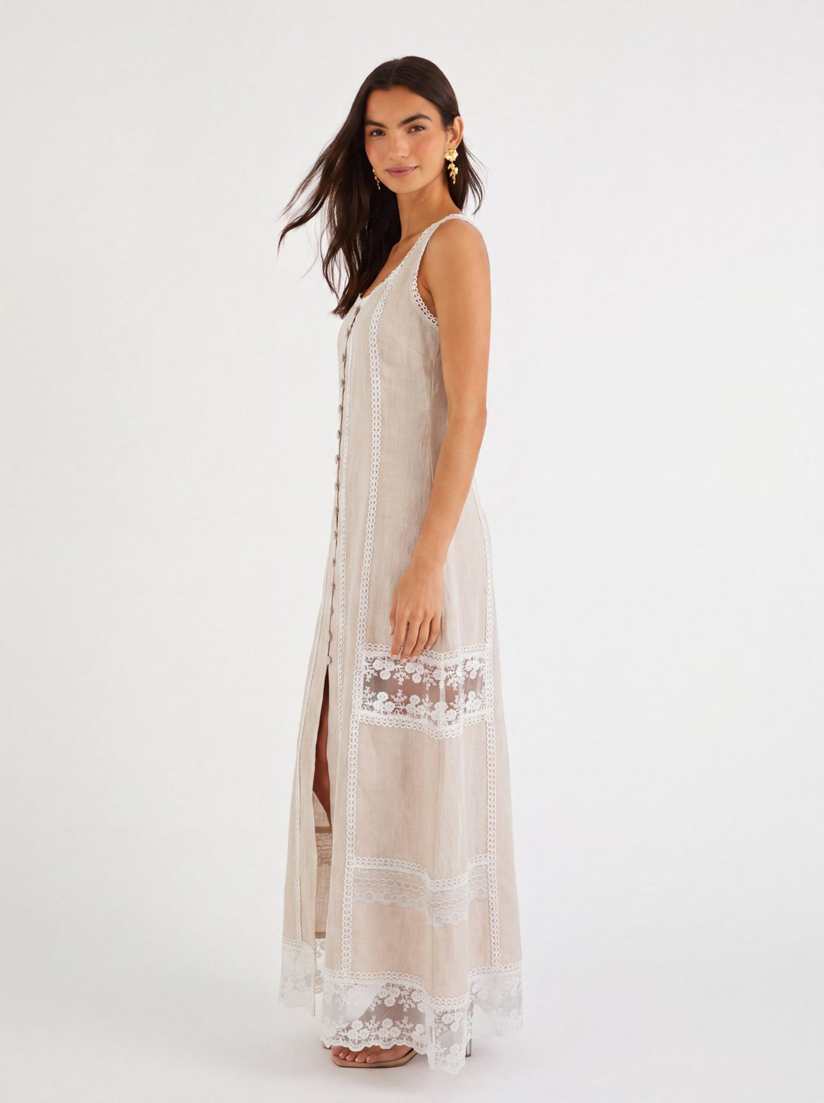 Ibiza Beige Dress, beige sleeveless 100% pure linen maxi dress with sweetheart neckline, fitted bodice and embroidered lace panel work – styled on model